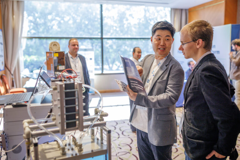 Delegates networking between sessions at the International Flow Battery Forum 2026