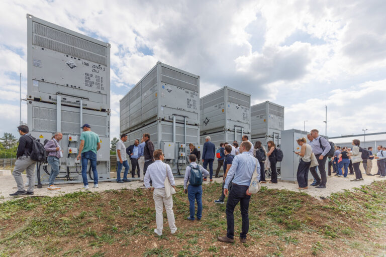 Delegates visiting a flow battery installation during the IFBF 2026 site visit in Hungary
