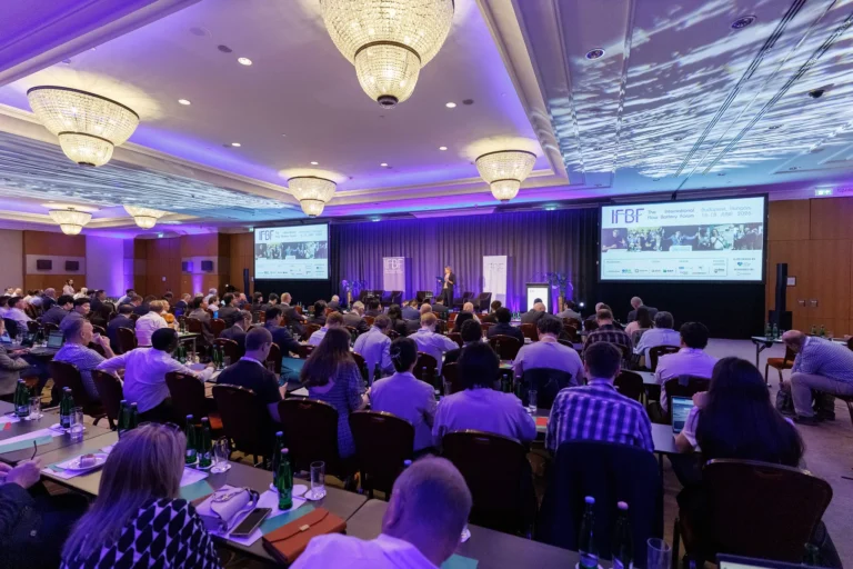 Delegates seated in the main conference room during a session at IFBF 2026